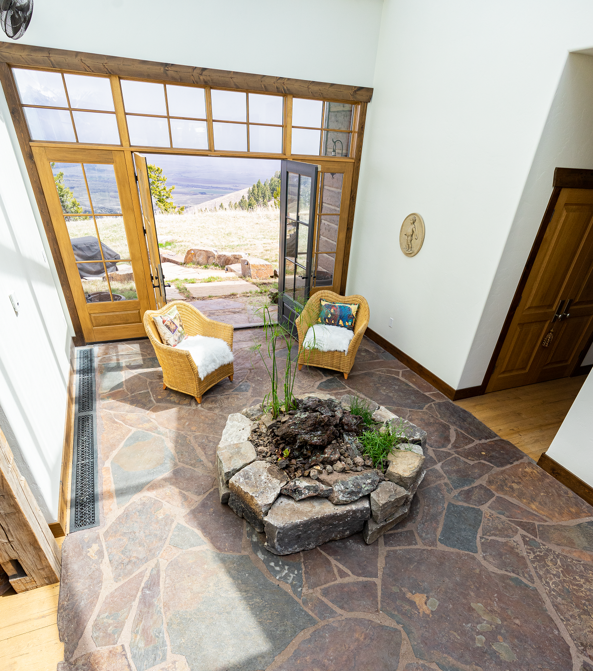 Interior planting with natural flagstone flooring