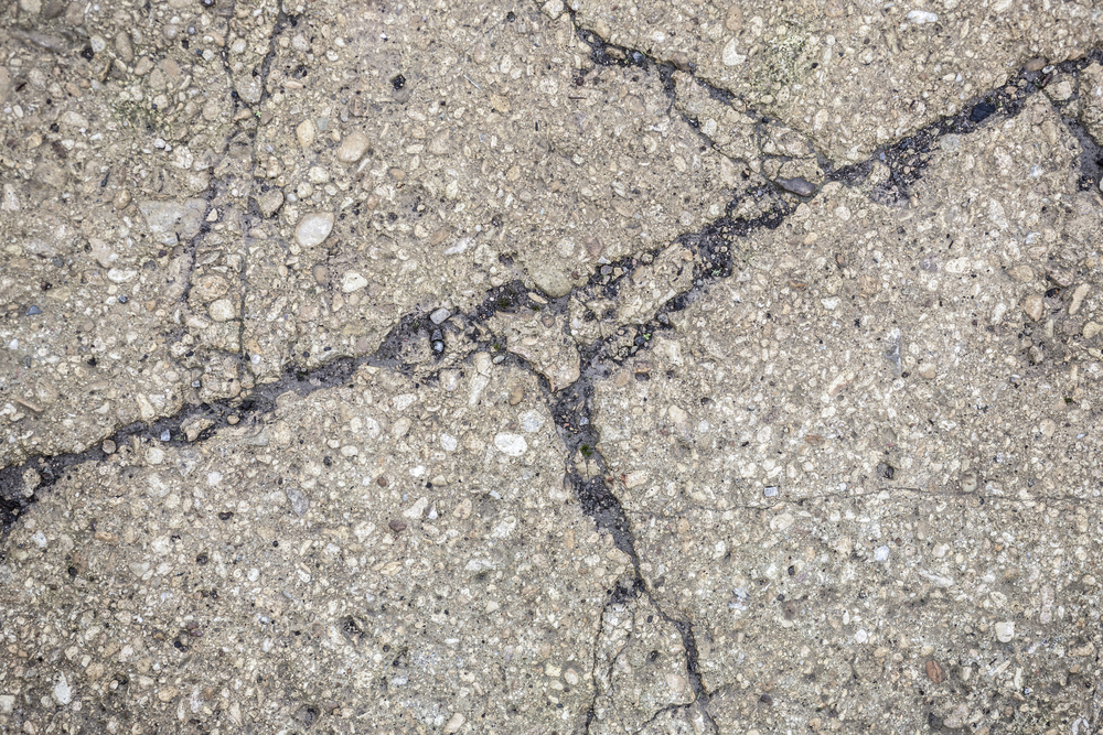 Cracked concrete floor outside-1