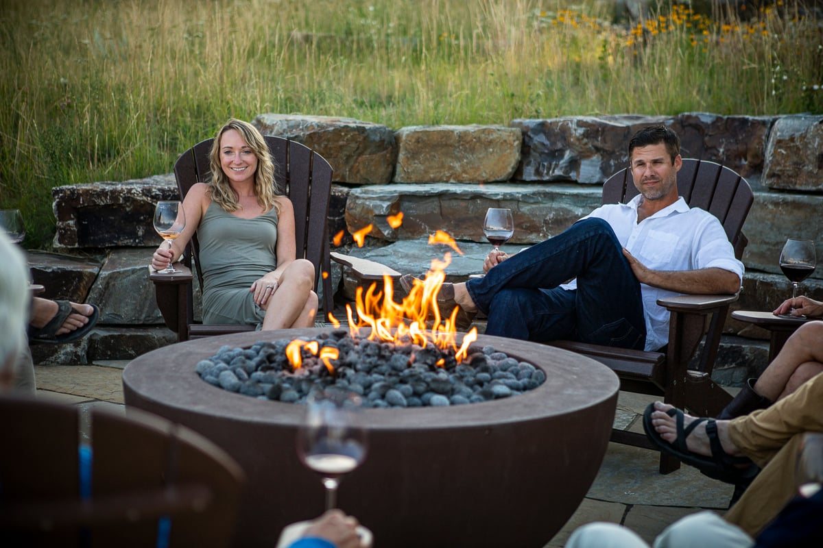 firepit on patio with family