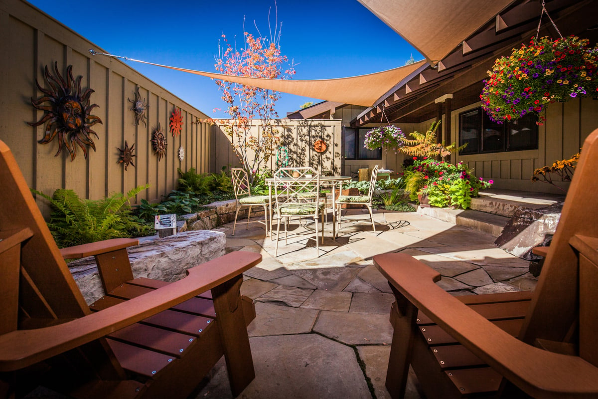 small backyard with natural stone patio