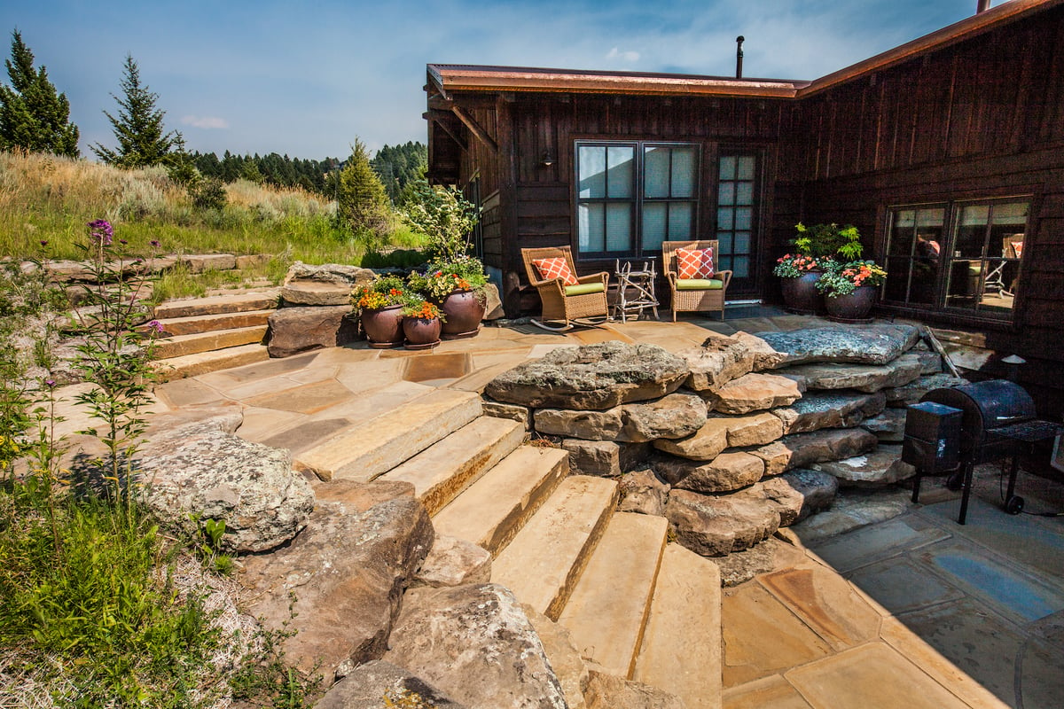 stone stairs and boulder retaining wall