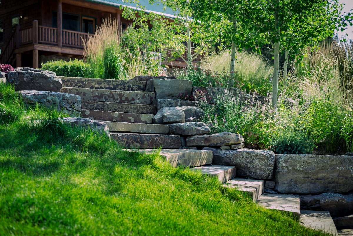 stone steps with plantings and retaining wall