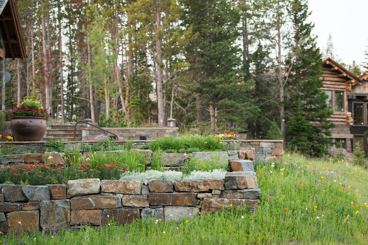natural stone wall with plantings