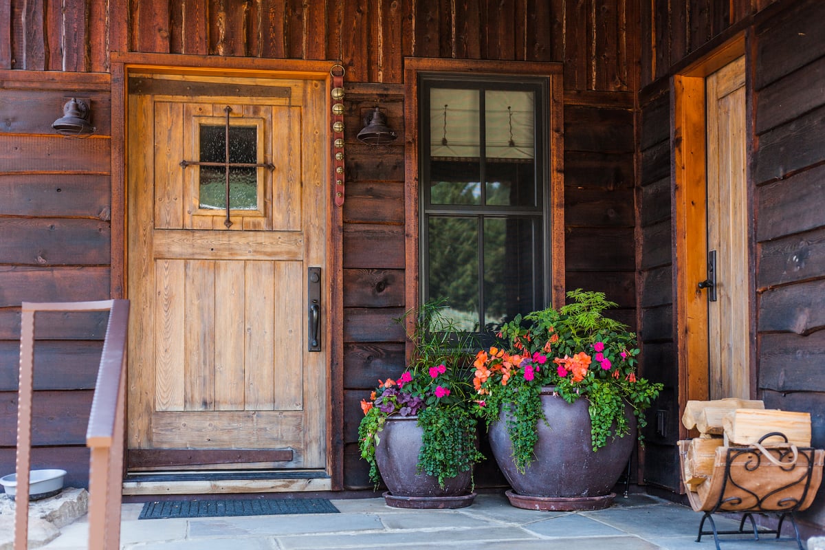 container gardens at front door of home