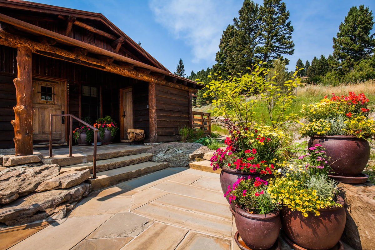 container gardens near entrance of home