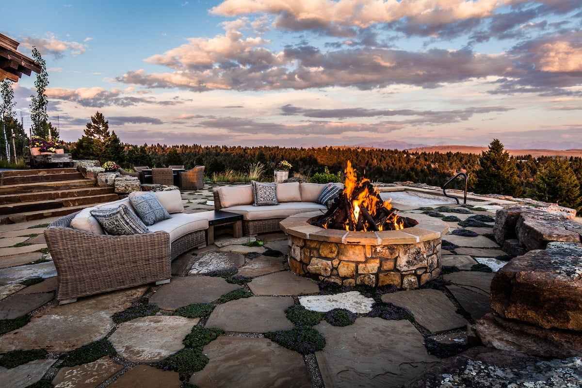 Fire pit and patio seating looking over mountains in Bozeman, MT