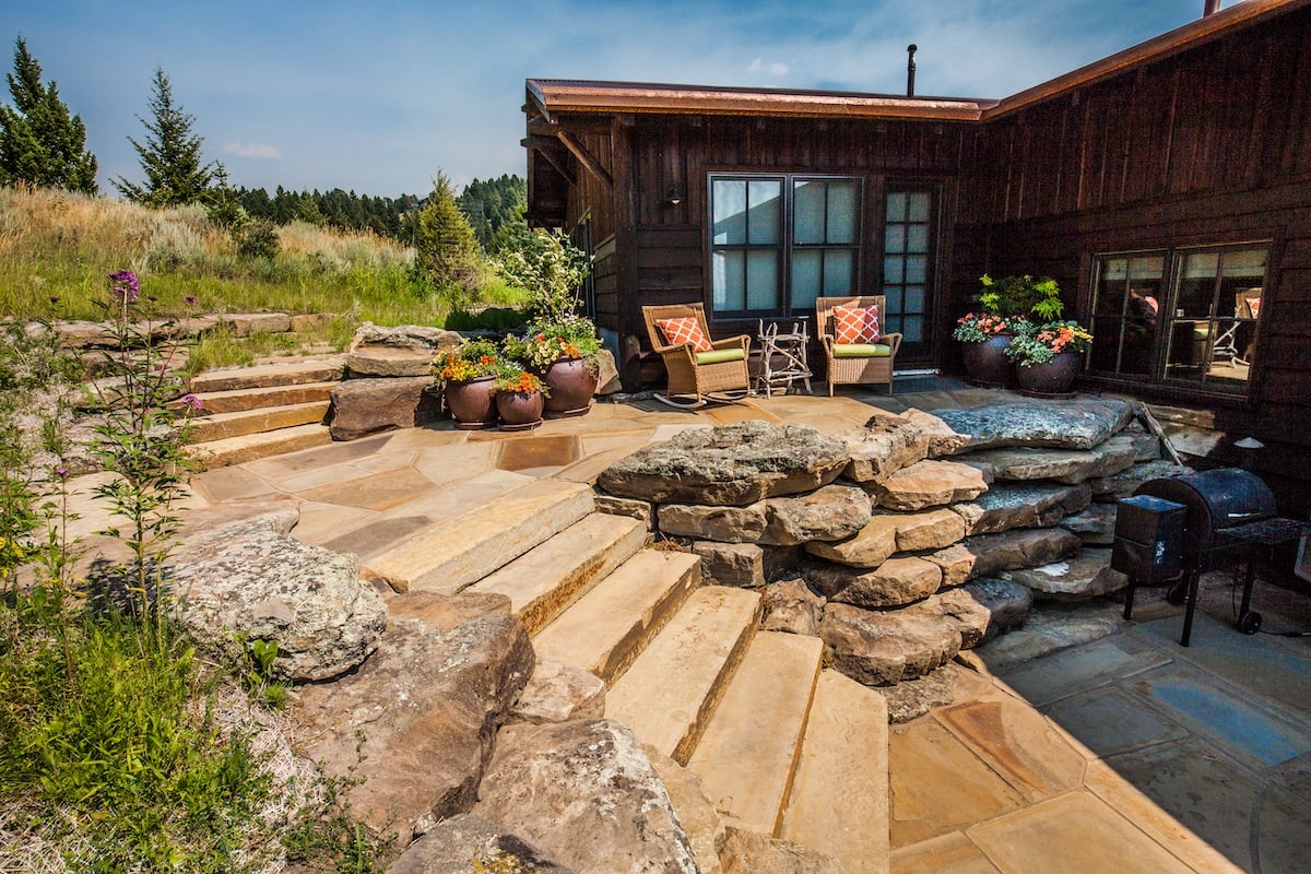 sloped backyard and patio with different levels