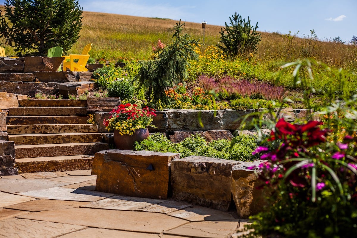 natural stone steps and walls with plantings