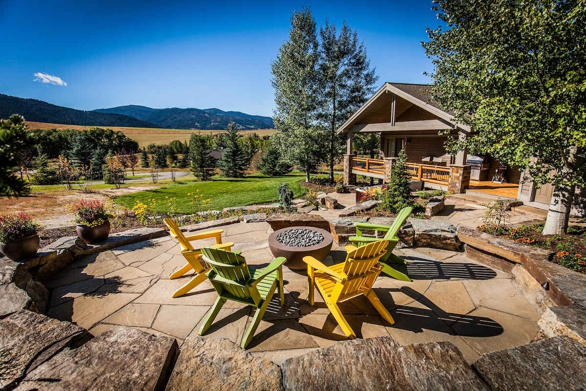 patio and fire bowl with chairs