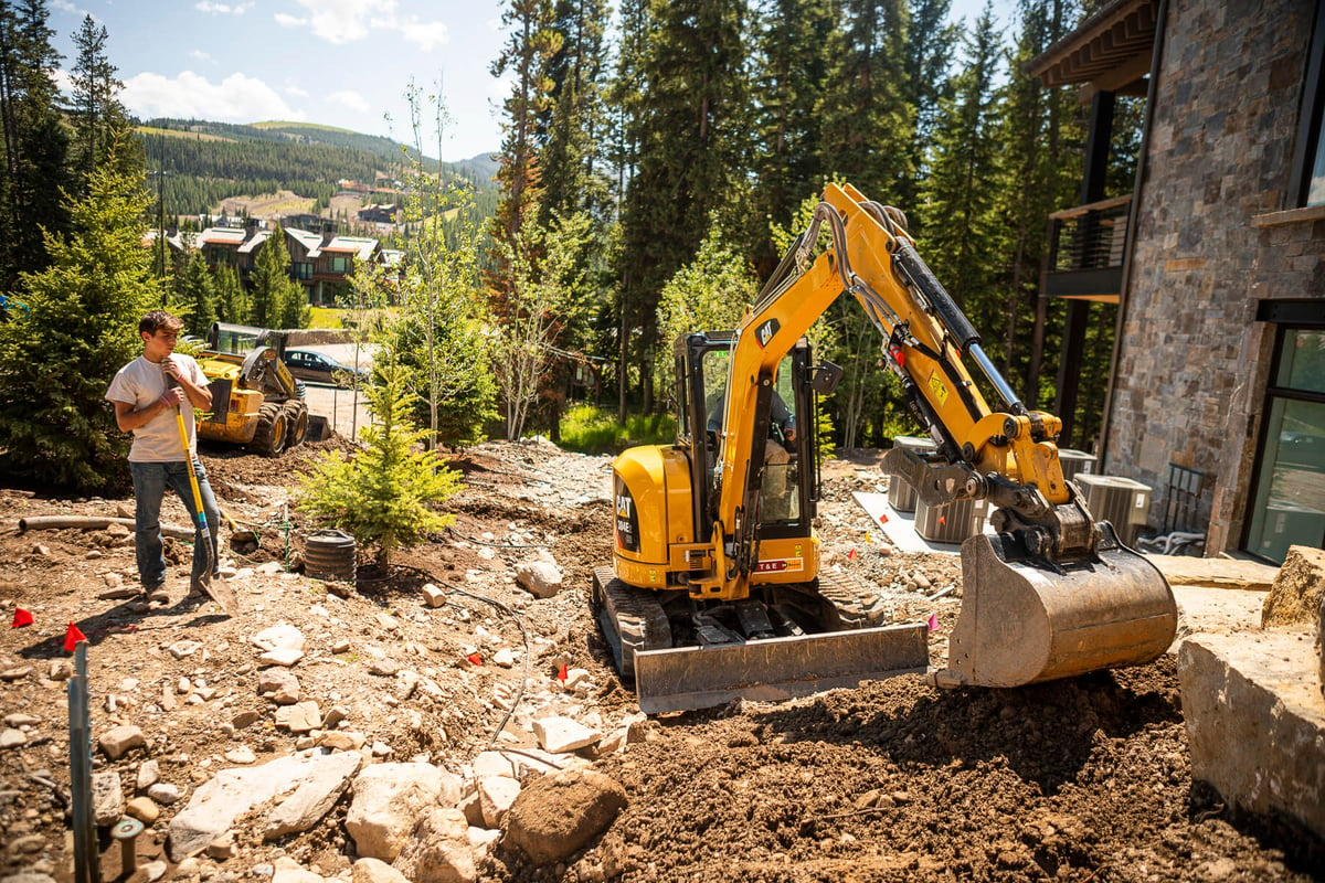 machine moves dirt for landscape project