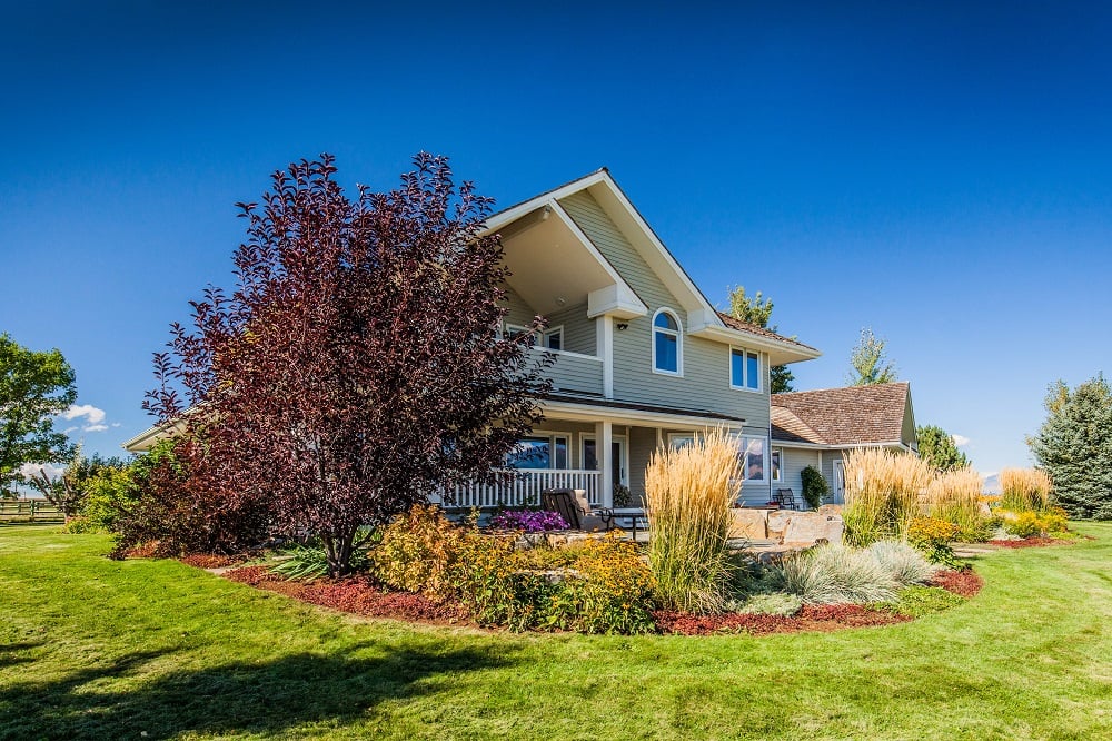 landscape in Montana with nicely trimmed and pruned trees and shrubs