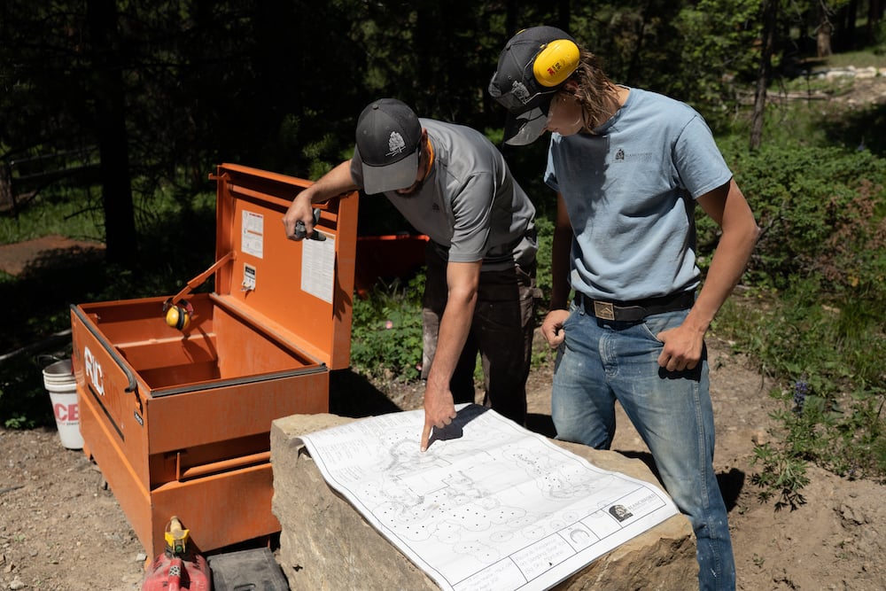 hardscape design plan with team members 