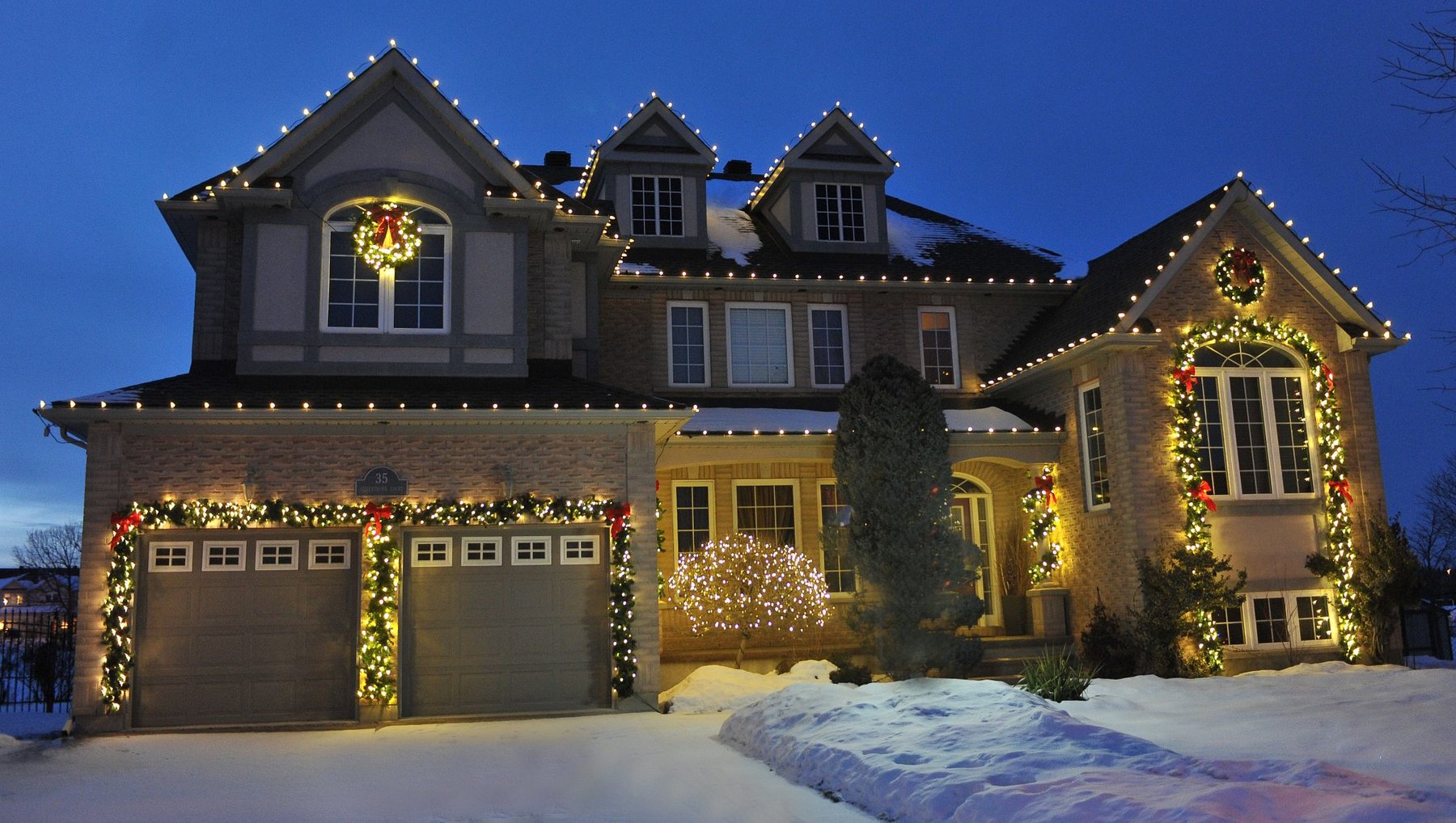 holiday lighting up an entire house