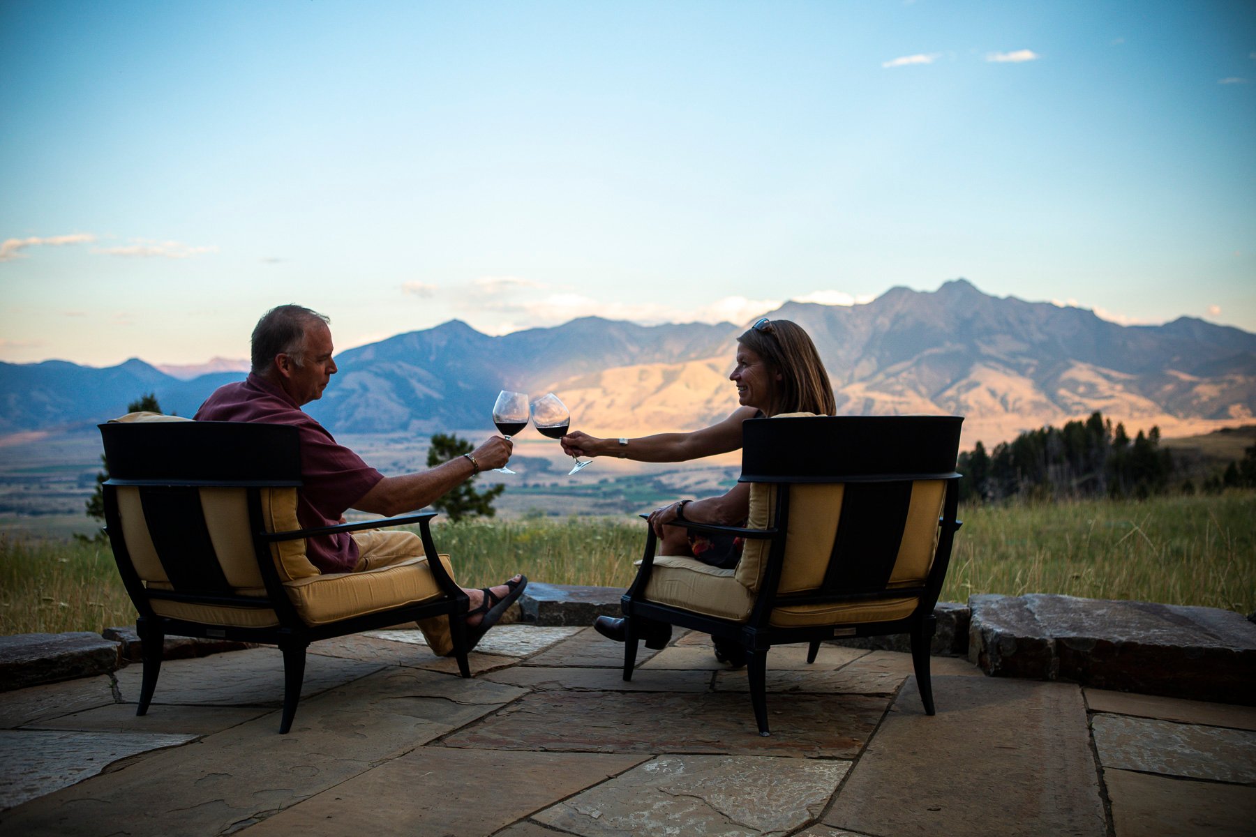 people enjoying patio and landscape