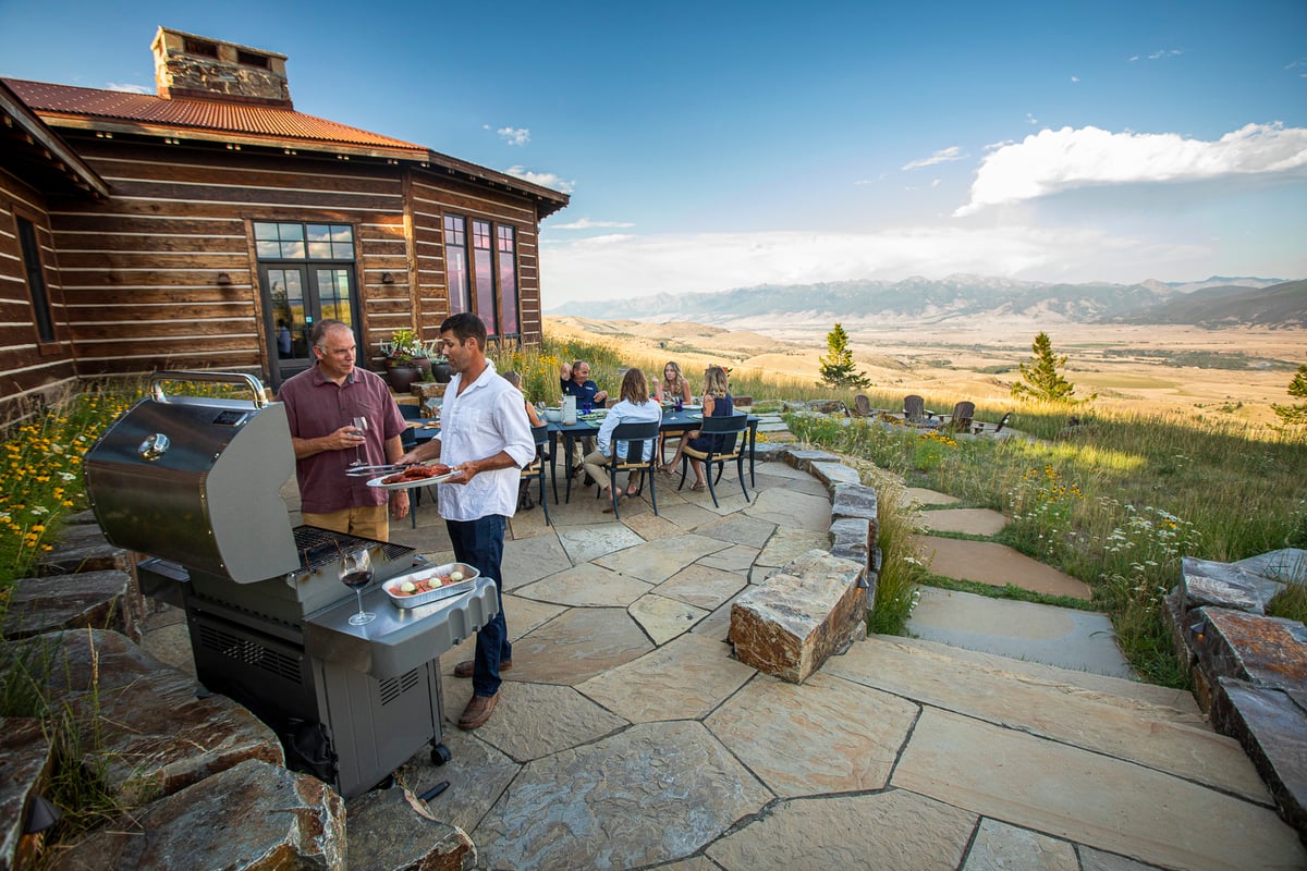 family backyard patio grilling in Montana 