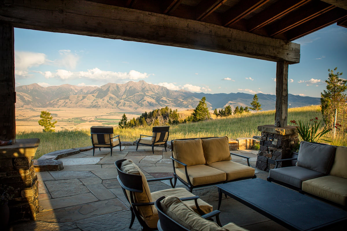 flagstone patio with pergola and view of mountains