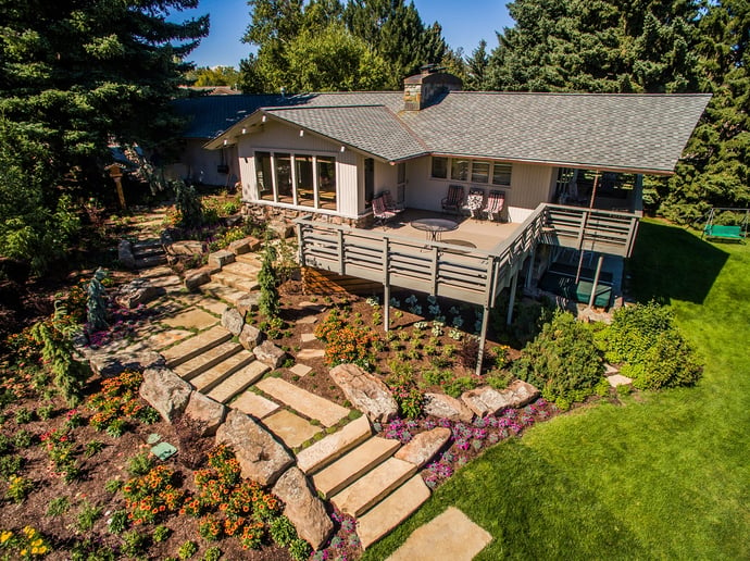 landscape design with plants under deck