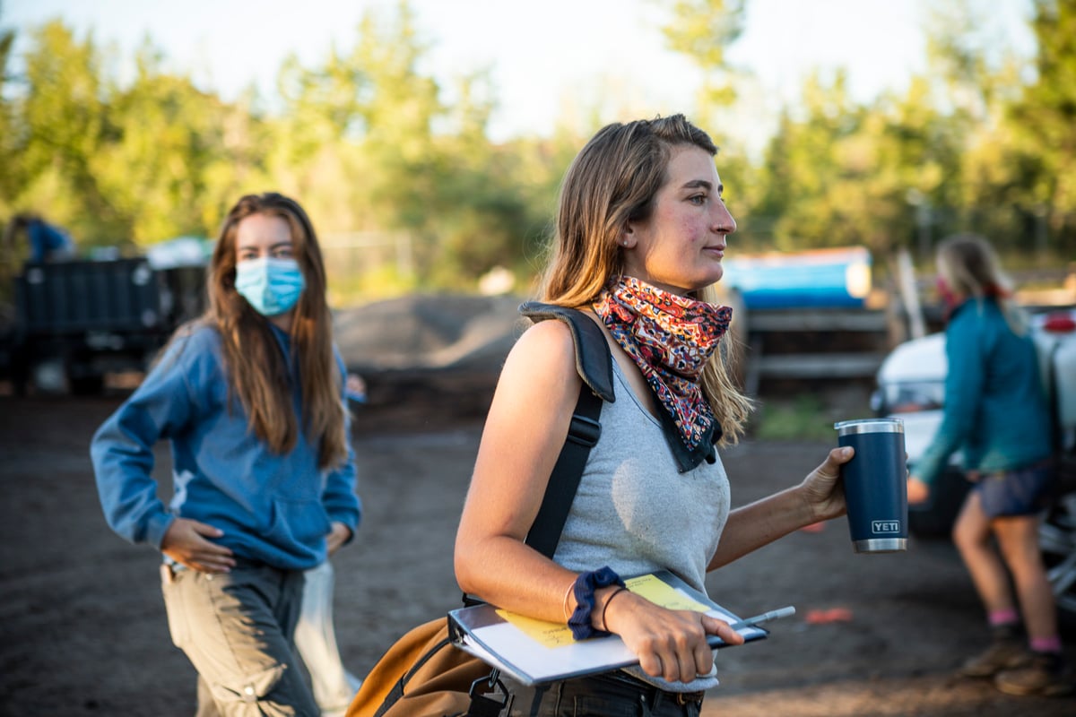 team leader gets ready for day in landscape yard