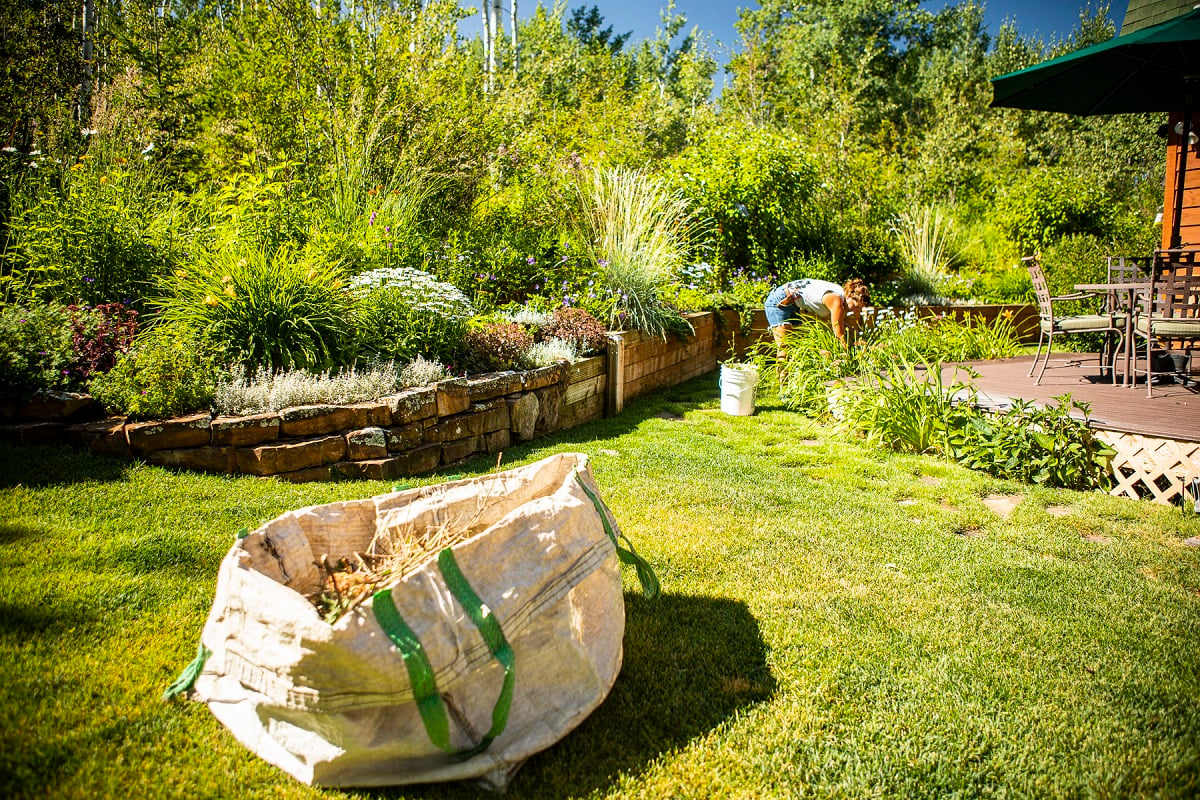 Blanchford Maintenance Team cleaning up perennials beds in Montana